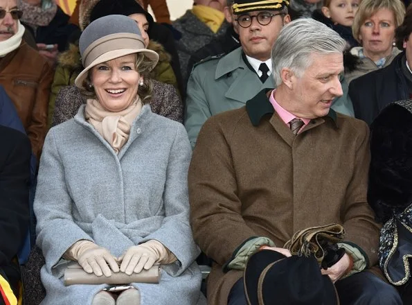 Queen Mathilde and King Philippe attended the Krakelingen Festival held in Geraardsbergen. Queen Mathilde wore Natan coat and Natan boots