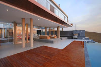 Geometric Beach House Design With Floating Glazed Upper Floor In Peru