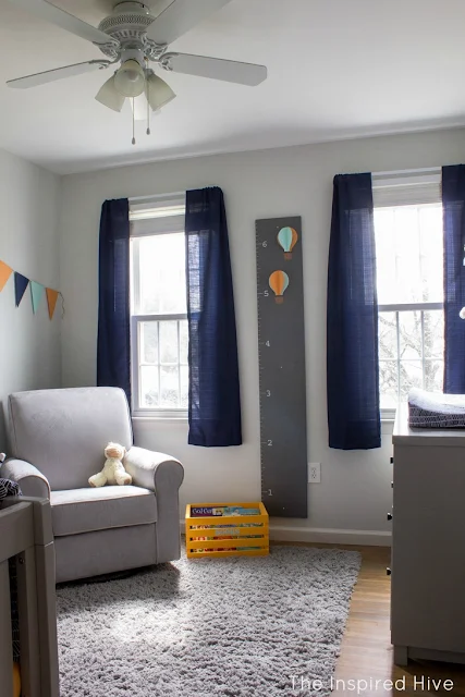 Navy, orange, and aqua hot air balloon nursery