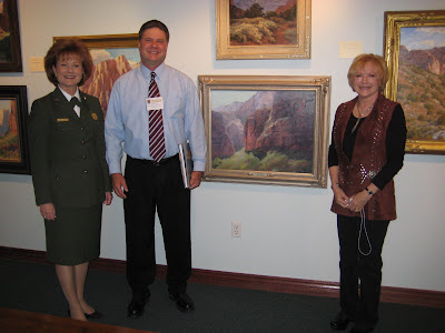 Lyndi Harvey, Roland Lee, and Flavia Eckholm at the Century of Sanctuary Art Exhibit