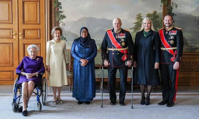 Crown Princess Mette-Marit wore a green floral print silk dress by H&M Conscious Exclusive. Queen Sonja and Princess Astrid
