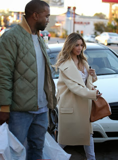 http://www.iafrica.tv/check-out-kim-kardashian-and-kanye-west-shopping-photos/#.UsObbPRmiSo