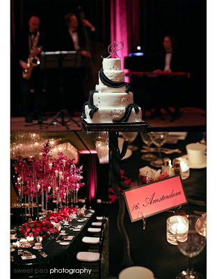 black table linens and white dinnerware The pink hued lighting combined