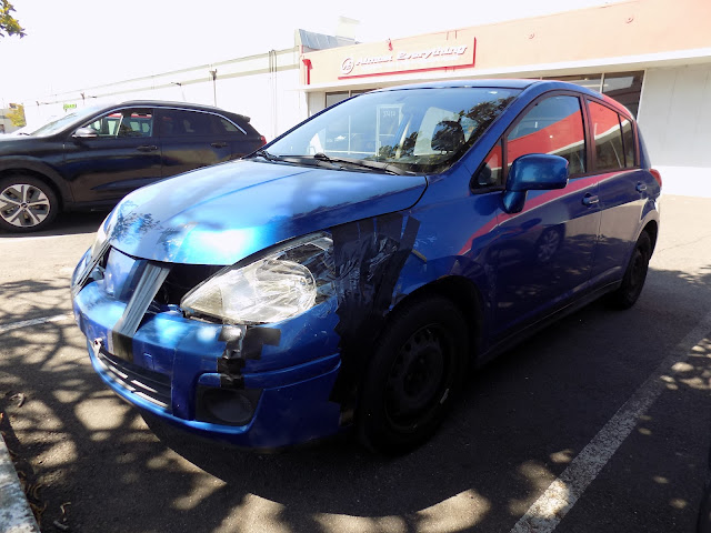 2008 Nissan Versa- Before repairs done at Almost Everything Autobody