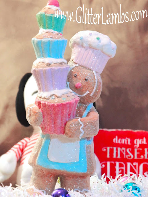 Gingerbread Boy Hobby Lobby Glitter Holding Stack of Cupcakes