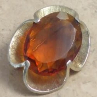 Large amber rhinestone brooch by Exquisite