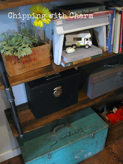 Chipping with Charm: Family Room Redo...crates and tool boxes for storage www.chippingwithcharm.blogspot.com