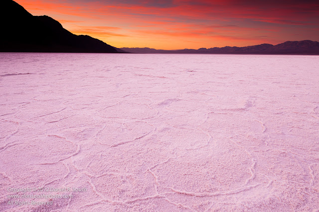 a photo of the sunrise on the badwater salt flats in death valley