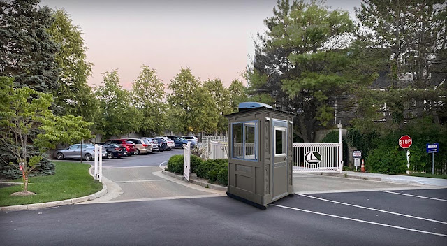 Security Guard Shed in Front of a Parking Lot Business