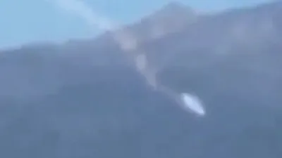 Silver UFO Disk filmed crashing into mountain analysis.
