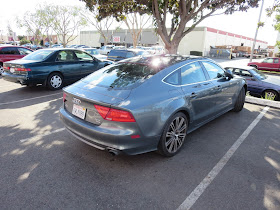 Audi A7 in for collision repairs at Almost Everything Auto Body