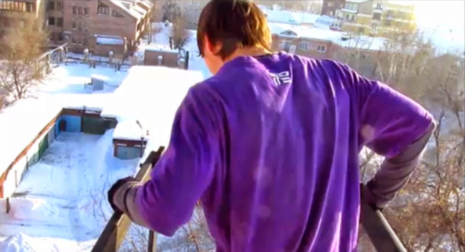  Russian Guy Jumps Into Snow From Roof Of Building... Because That's What You Do