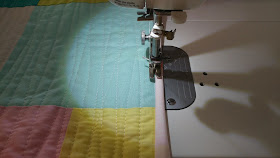 Binding a quilt by machine