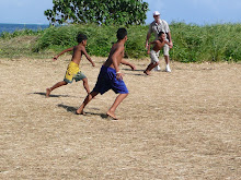 Playing soccer on a local scale.