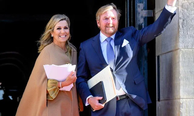 Queen Maxima wore an opulence ribbon skirt by Lena Hoschek. Yellow silk satin blouse. Princess Beatrix, Princess Margriet