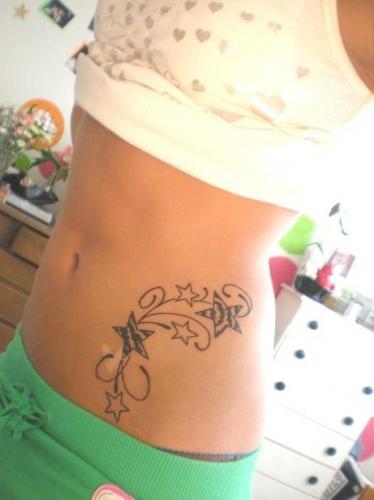 side stomach tattoos for girls