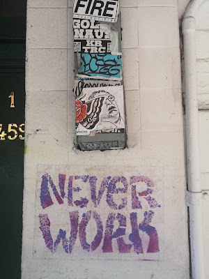 Never Work stencil art on King Street Newtown.