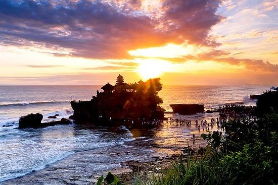 Admire the beautiful sunset at Tanah Lot Temple