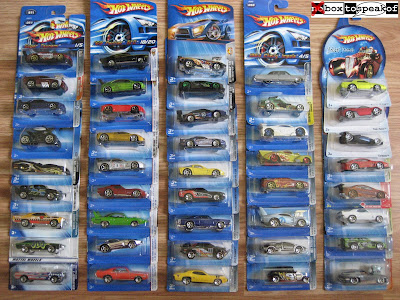 This auction is for a lot of 43 single packaged Hot Wheels cars and other