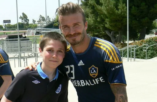 You Lucky Boy: Will Kitching poses with David Beckham