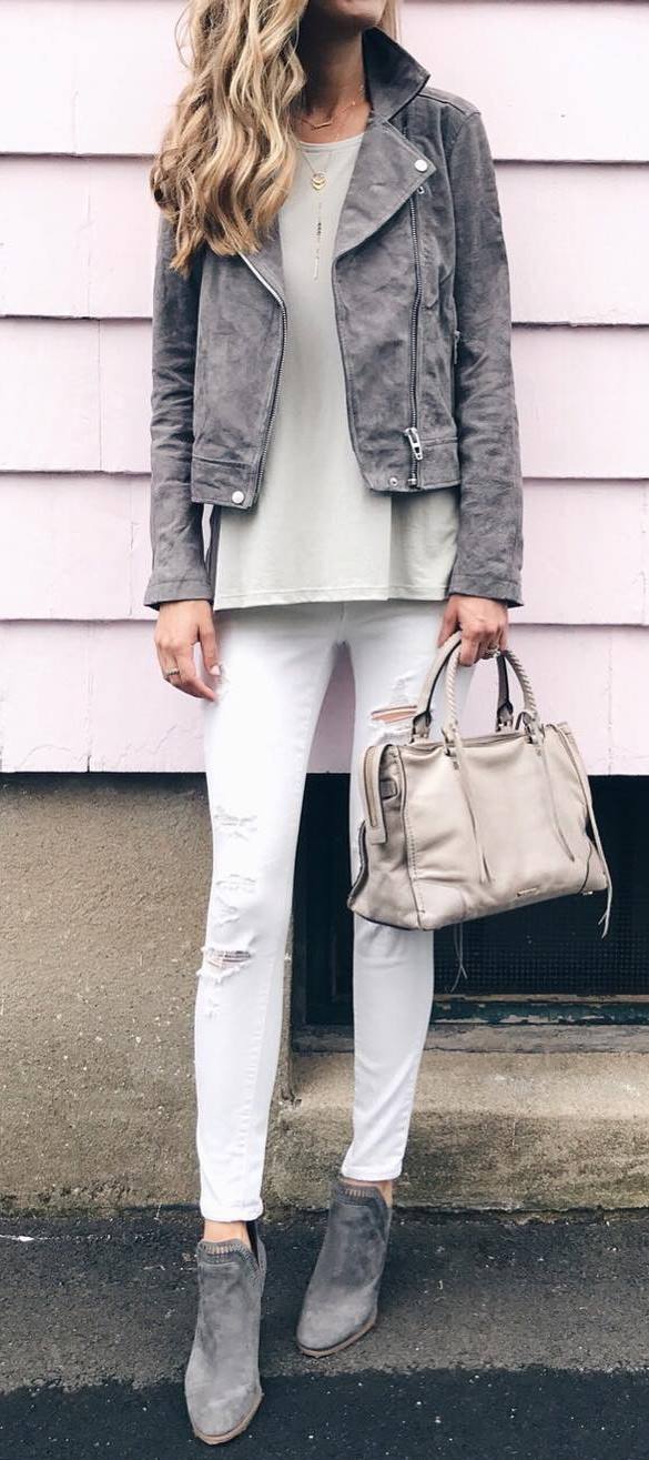 how to wear a grey moto jacket : white top + rips + boots + bag