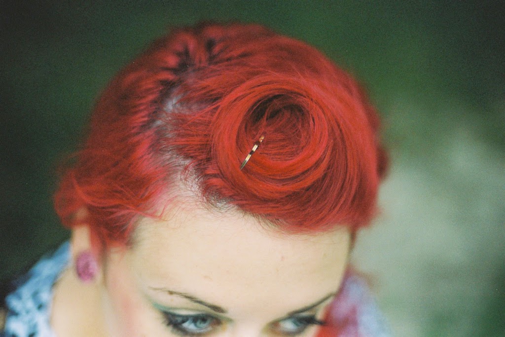 Semi-permanent dye is great for refreshing bright colours like this cherry red hairstyle