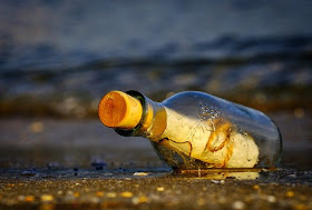 Message in a bottle on the beach