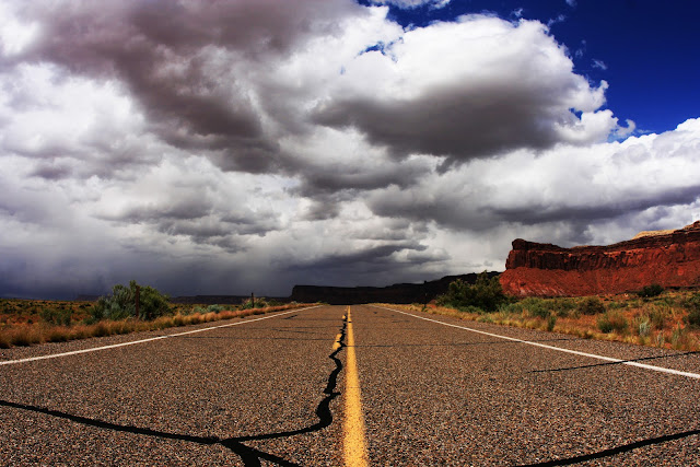 Storm clouds rolling in over the drive into Canyonlands National Park in Utah.