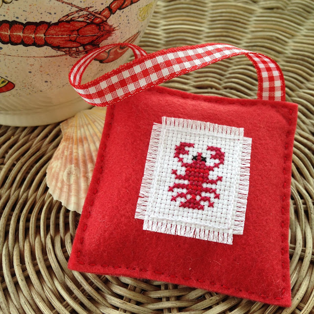 Floss & Fleece: cross-stitched lobster ornament