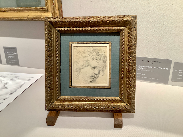 Small sketch of a child’s head in elaborate frame