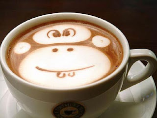 funny monkey face on coffee
