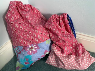 Drawstring fabric laundry bags