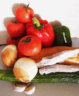 Veggie group picture with tomatoes, bell pepper, onion, garlic. cucumber, bread and shrimps