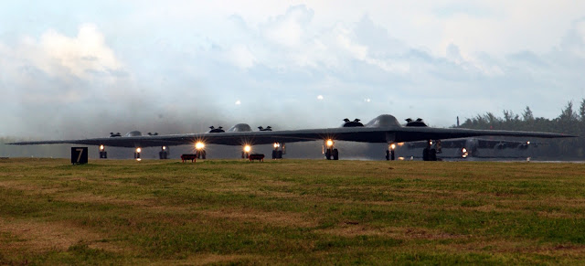 B-2 Spirit bombers taxi down the runway