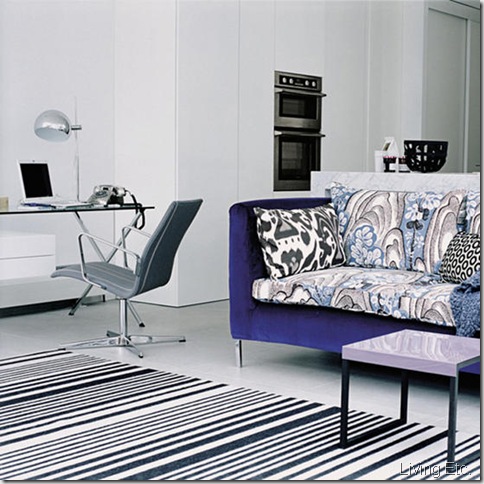 White living room floral busy sofa cushions glass table swival chair polished tiled flooring striped black and white rug L etc 11/2007 Pub Orig