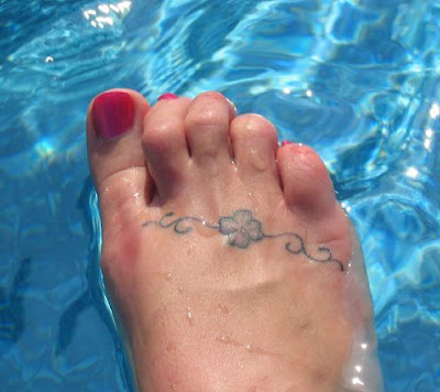 Small Feminine Tattoos LoveToKnow Tattoos Cute little foot shamrock tattoo