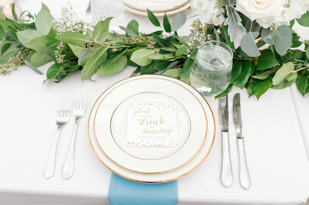 Foliage place setting at table for guests