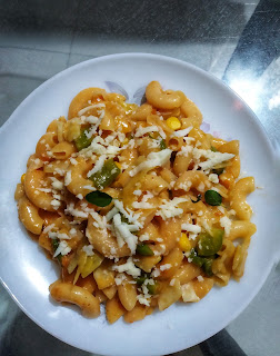 Red sauce pasta with cheese on top