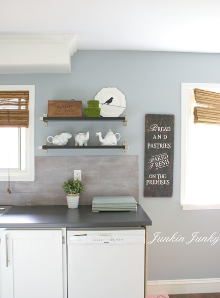 Weathered wood plank backsplash at Junkin Junky