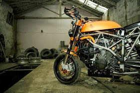 Custom KTM | KTM Cafe Racer. KTM Modified into a beautiful Cafe racer. This Custom KTM Cafe Racer is based on 2006 KTM 950 SM. This KTM 950 "Cafe racer" gives a "neo-retro" appeal. Custom KTM is named Miss Hyde KTM by Osiyuyu. KTM Modifications Honda CB 750 gas tank, Custom  Kineo wheels, Pirelli Phantom tires, KTM racing Neken handlebars, EMIG racing triple trees, Custom carbon fiber seat cowl, Cafe racer seat, KTM Custom Exhaust.