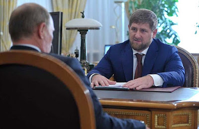 Vladimir Putin and Ramzan Kadyrov (right)