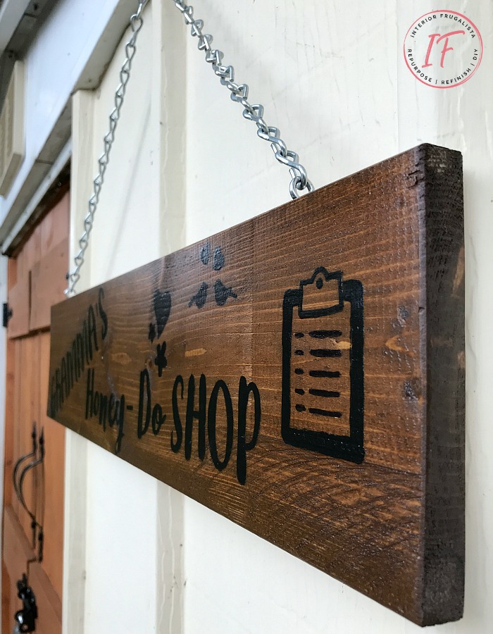 How to get the look of a wood-burned sign with paint! A fun DIY salvaged junk wood "faux wood-burned" Garden Shed Sign that matches the real thing!