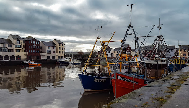 A photo of fishing boats in Maryport Harbour