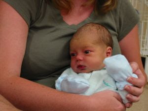 Image: Mom holding baby boy, by Benjamin Turner on freeimages.com