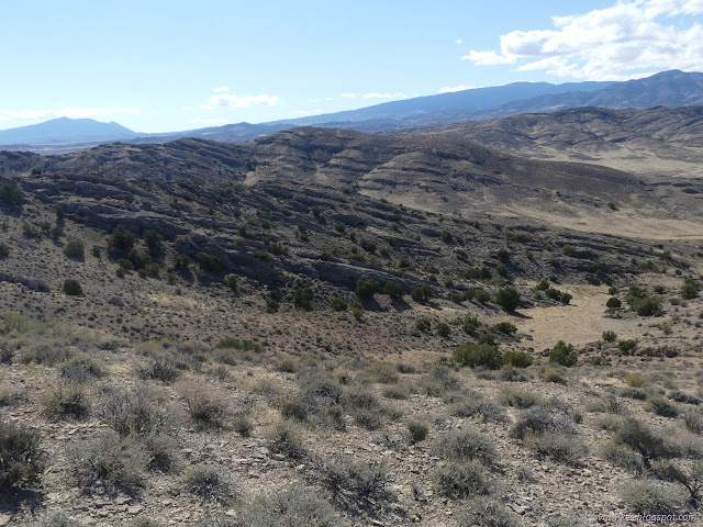 82: rounds of green in a layered valley