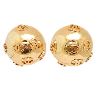Vintage 1990's gold ball Chanel earrings with "CC" logo pattern. 