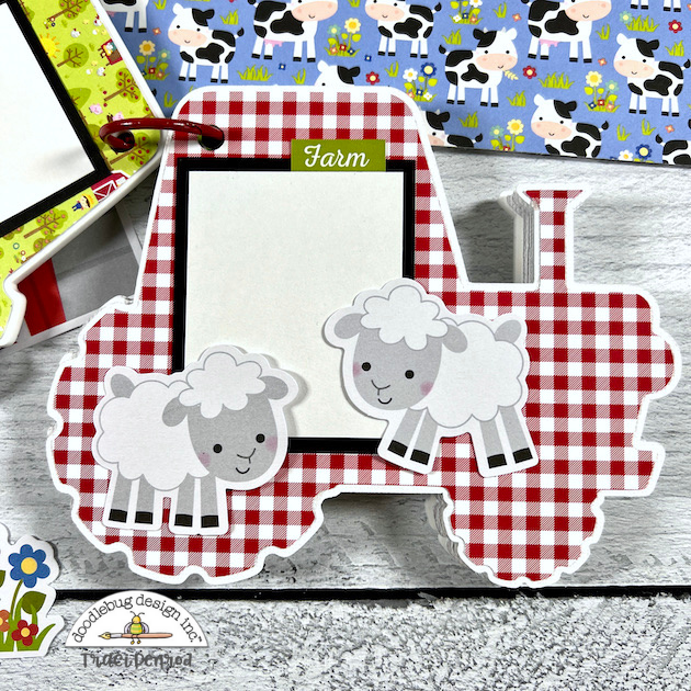 Tractor shaped farm scrapbook album page with sheep