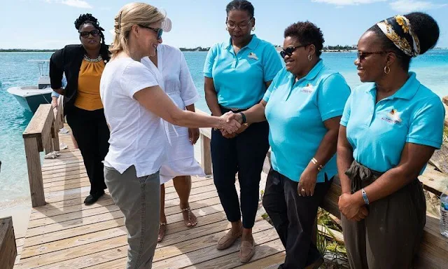 On the Turks and Caicos Islands, the Countess of Wessex wore a Nixie silk crepe de chine dress by Erdem