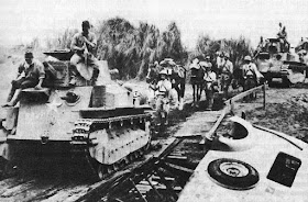 Japanese Type 89 I-Go medium tanks and troops moving toward Manila, Philippine Islands, December 22, 1941.