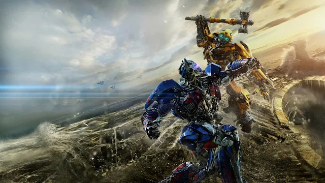 Bumblebee vs Optimus Prime Transformers Movie wallpaper.